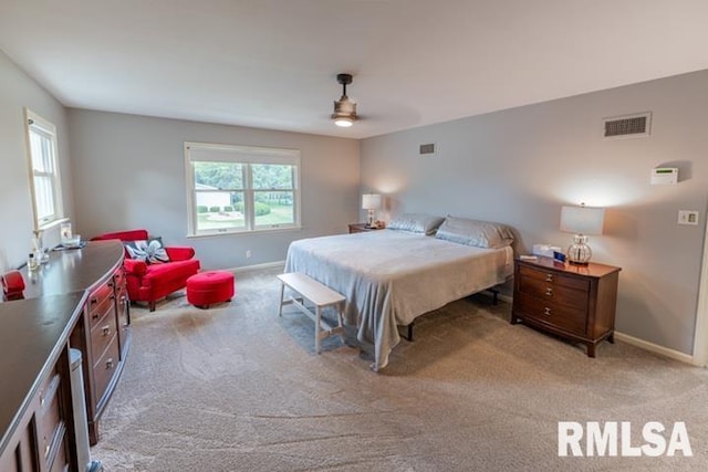 210 W Wolf Rd, Peoria, IL 61614 - bedroom with light carpet and ceiling fan