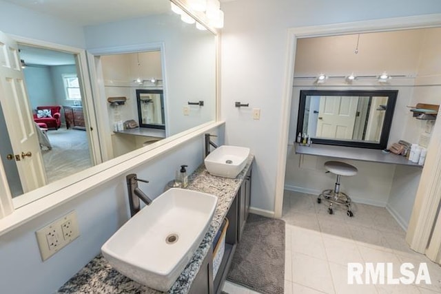 210 W Wolf Rd, Peoria, IL 61614 - bathroom featuring tile patterned flooring and double vanity