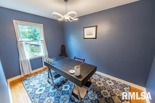 210 W Wolf Rd, Peoria, IL 61614 - office space featuring a chandelier and wood finished floors