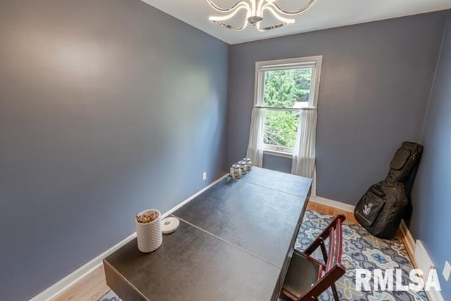 210 W Wolf Rd, Peoria, IL 61614 - office with a chandelier and wood finished floors