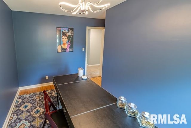 210 W Wolf Rd, Peoria, IL 61614 - unfurnished office featuring a chandelier and baseboards