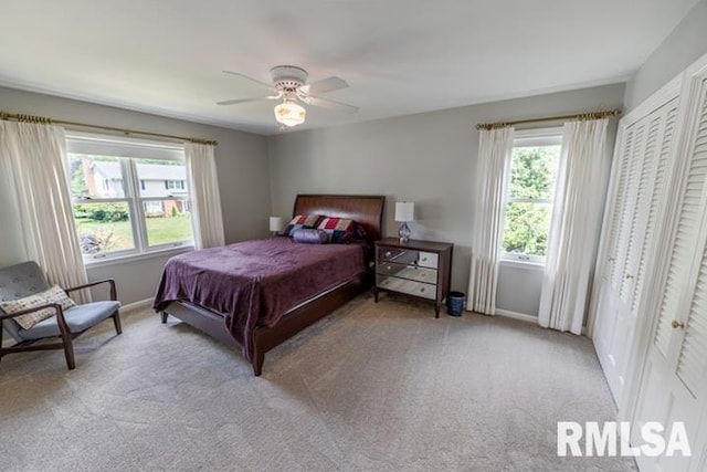 210 W Wolf Rd, Peoria, IL 61614 - bedroom featuring light colored carpet and a ceiling fan