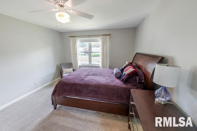 210 W Wolf Rd, Peoria, IL 61614 - carpeted bedroom featuring ceiling fan and baseboards