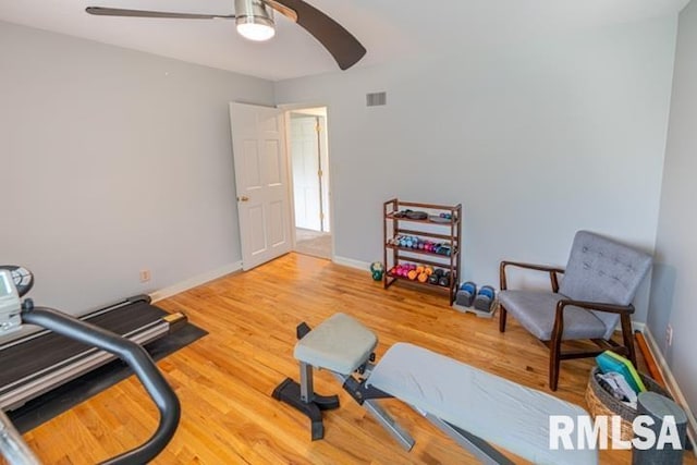 210 W Wolf Rd, Peoria, IL 61614 - workout room with a ceiling fan and wood finished floors