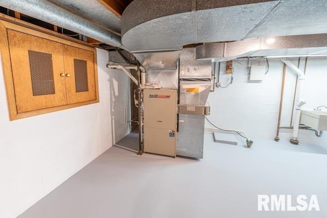 210 W Wolf Rd, Peoria, IL 61614 - unfinished basement featuring a sink and heating unit