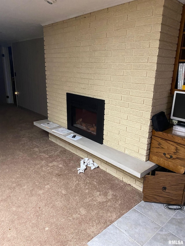 1517 W Teton Dr, Peoria, IL 61614 - detailed view of a fireplace and carpet flooring