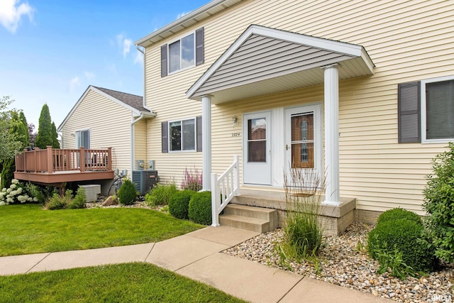 2024 S 2nd Ave, Morton, IL 61550 - property entrance with a lawn and a deck