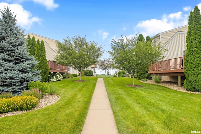 2024 S 2nd Ave, Morton, IL 61550 - view of green lawn featuring a wooden deck