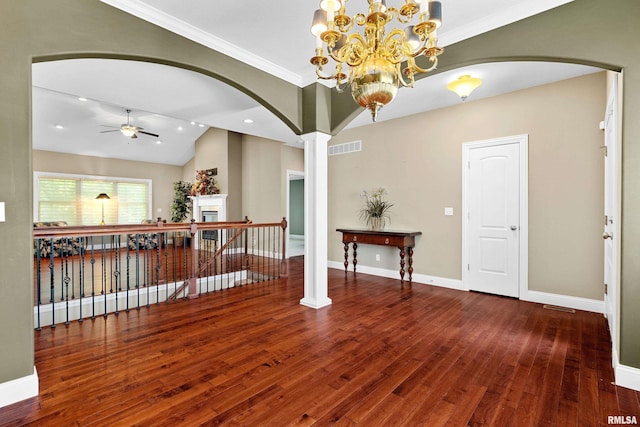 2627 W Lake Pointe Ter, Peoria, IL 61614 - spare room with arched walkways, a ceiling fan, wood-type flooring, crown molding, and recessed lighting