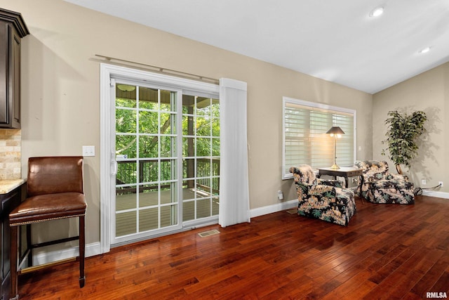 2627 W Lake Pointe Ter, Peoria, IL 61614 - sitting room featuring hardwood / wood-style floors and lofted ceiling