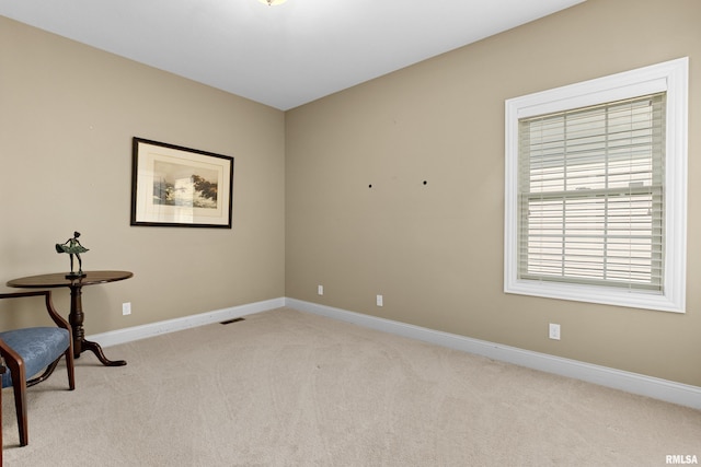2627 W Lake Pointe Ter, Peoria, IL 61614 - unfurnished room with light colored carpet and baseboards