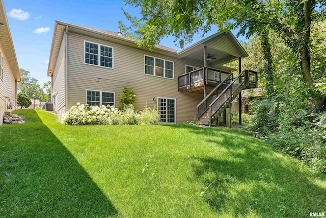 2627 W Lake Pointe Ter, Peoria, IL 61614 - back of house with a ceiling fan, stairway, a yard, and a wooden deck