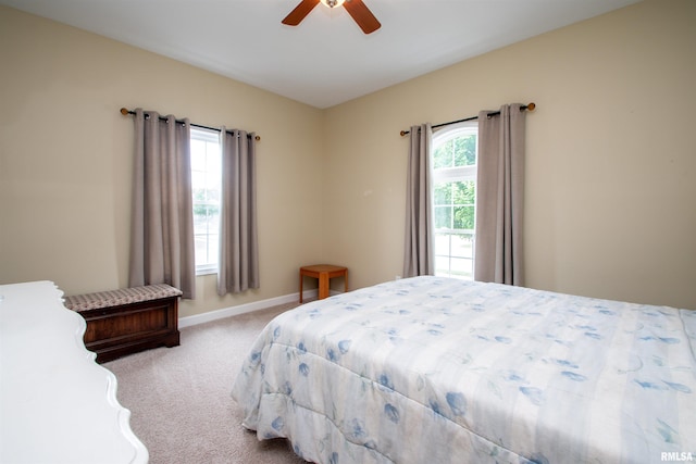 2203 W Gerald Ct, Peoria, IL 61615 - carpeted bedroom with baseboards and a ceiling fan