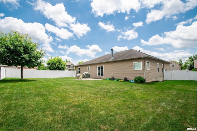 2203 W Gerald Ct, Peoria, IL 61615 - rear view of property featuring a patio area and a fenced backyard