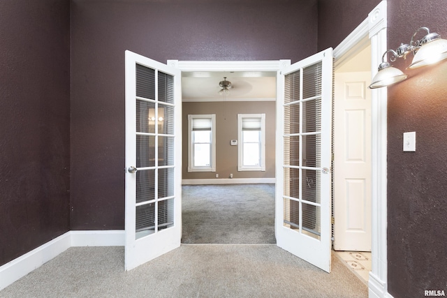 1315 N Bourland Ave, Peoria, IL 61606 - carpeted empty room with ornamental molding, ceiling fan, and a textured wall