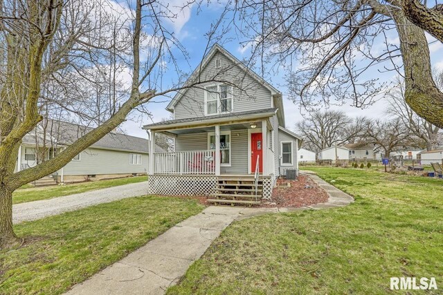 903 E Lake Ave, Peoria Heights, IL 61616 - view of front of house featuring a porch, driveway, and a front lawn