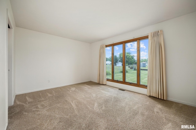 3524 W Saymore Ln, Peoria, IL 61615 - carpeted spare room with baseboards