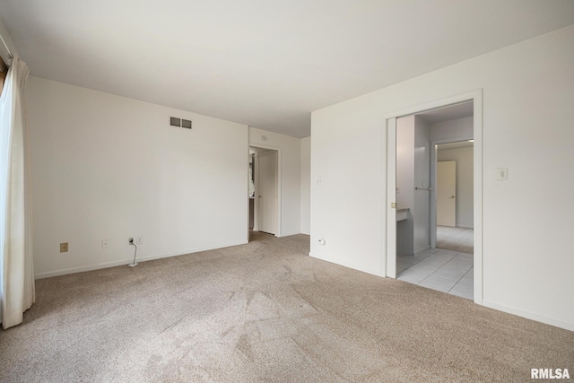3524 W Saymore Ln, Peoria, IL 61615 - unfurnished bedroom featuring light carpet and baseboards