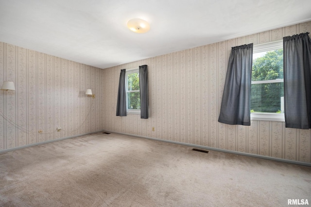 3524 W Saymore Ln, Peoria, IL 61615 - carpeted spare room featuring healthy amount of natural light