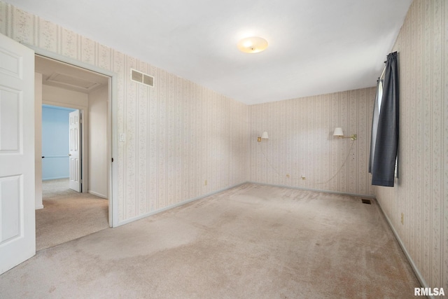 3524 W Saymore Ln, Peoria, IL 61615 - carpeted spare room featuring wallpapered walls and baseboards