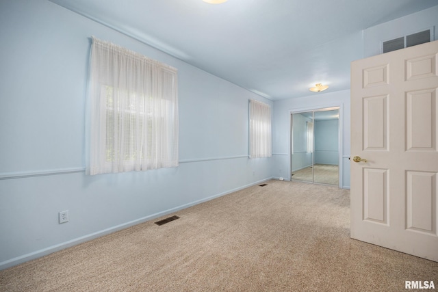 3524 W Saymore Ln, Peoria, IL 61615 - empty room featuring carpet floors and baseboards