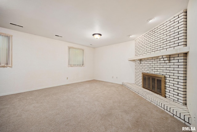 3524 W Saymore Ln, Peoria, IL 61615 - unfurnished living room featuring carpet flooring and a fireplace