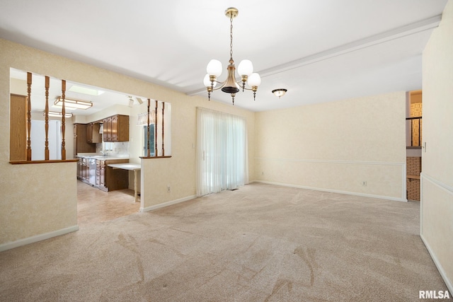 3524 W Saymore Ln, Peoria, IL 61615 - unfurnished living room with a chandelier and light colored carpet