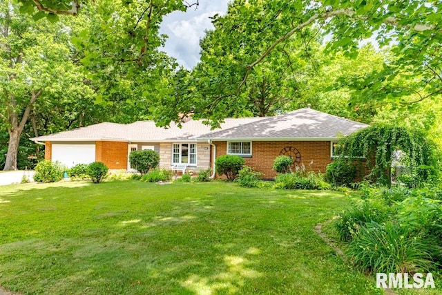 926 Birchwood Dr, Washington, IL 61571 - ranch-style house with driveway, an attached garage, a front lawn, and brick siding