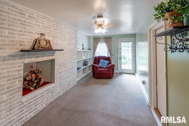 926 Birchwood Dr, Washington, IL 61571 - living area featuring carpet flooring, a fireplace, and ceiling fan