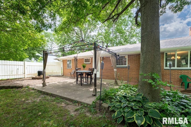 926 Birchwood Dr, Washington, IL 61571 - rear view of property featuring brick siding and a patio area
