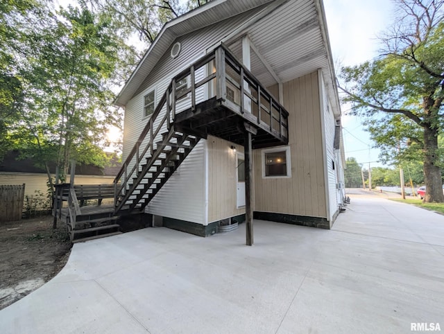 218 Meadow Lawn St, Manito, IL 61546 - rear view of house featuring stairway