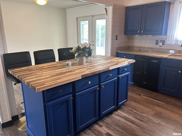 3406 W Brookside Dr, Peoria, IL 61615 - kitchen with blue cabinets, butcher block counters, and dishwasher