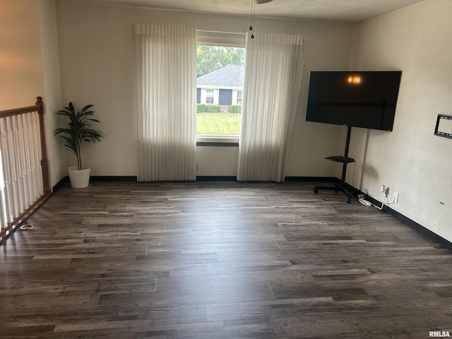 3406 W Brookside Dr, Peoria, IL 61615 - unfurnished living room with dark wood-style floors
