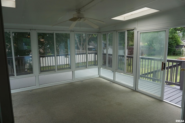 3406 W Brookside Dr, Peoria, IL 61615 - unfurnished sunroom featuring a skylight