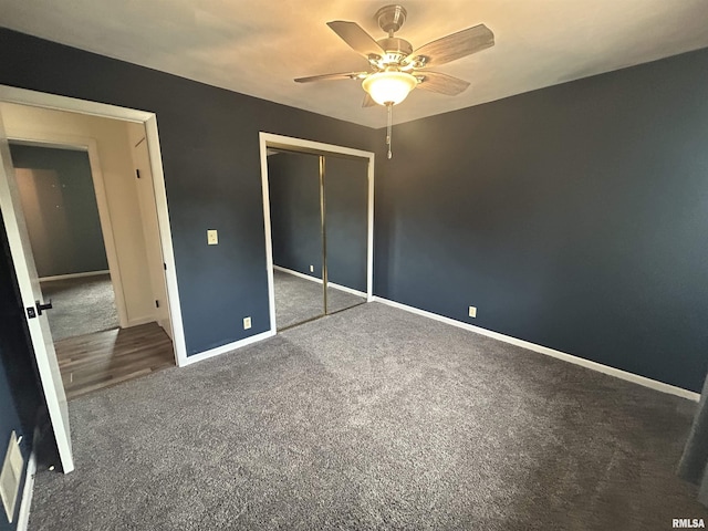 3406 W Brookside Dr, Peoria, IL 61615 - unfurnished bedroom with carpet floors, a closet, and a ceiling fan