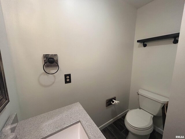 3406 W Brookside Dr, Peoria, IL 61615 - bathroom featuring toilet and wood finished floors
