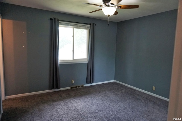 3406 W Brookside Dr, Peoria, IL 61615 - spare room with ceiling fan and dark colored carpet