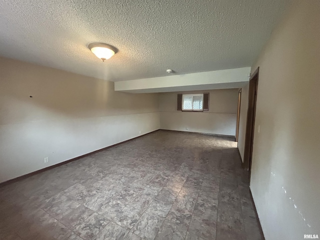 3406 W Brookside Dr, Peoria, IL 61615 - below grade area with a textured ceiling