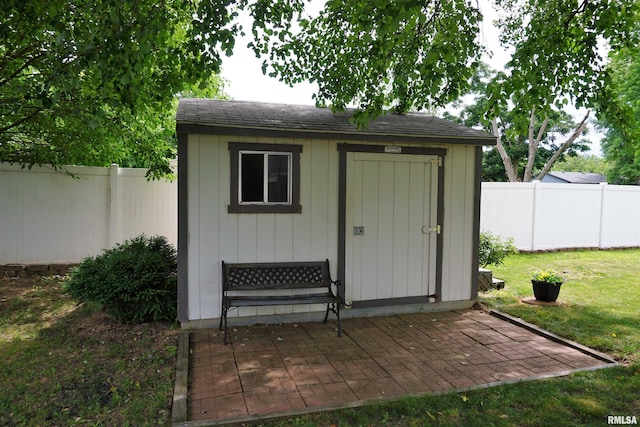 3406 W Brookside Dr, Peoria, IL 61615 - view of shed with a fenced backyard