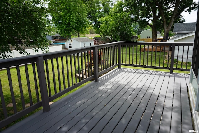 3406 W Brookside Dr, Peoria, IL 61615 - wooden deck featuring a fenced backyard and a shed