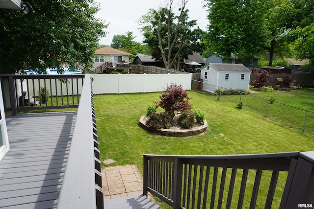 3406 W Brookside Dr, Peoria, IL 61615 - fenced backyard with a wooden deck