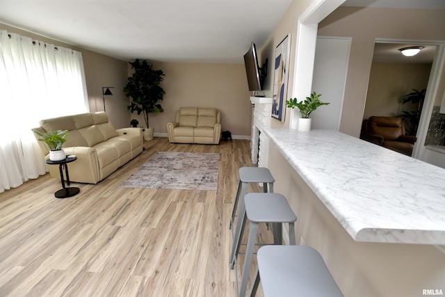 4527 N Nelson Dr, Peoria, IL 61614 - living room featuring wood finished floors and baseboards