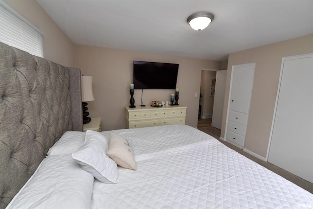 4527 N Nelson Dr, Peoria, IL 61614 - carpeted bedroom featuring baseboards
