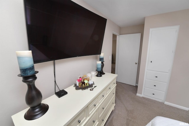 4527 N Nelson Dr, Peoria, IL 61614 - bedroom featuring light carpet and baseboards