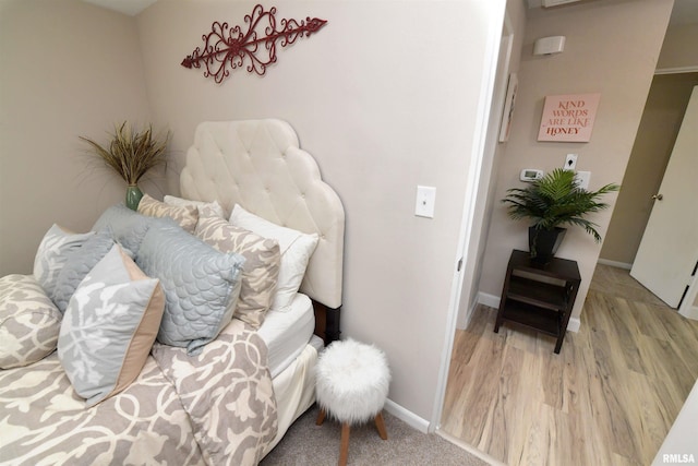 4527 N Nelson Dr, Peoria, IL 61614 - bedroom featuring wood finished floors and baseboards