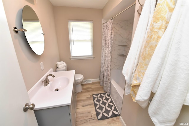 4527 N Nelson Dr, Peoria, IL 61614 - bathroom with vanity, wood finished floors, and shower / bath combination with curtain