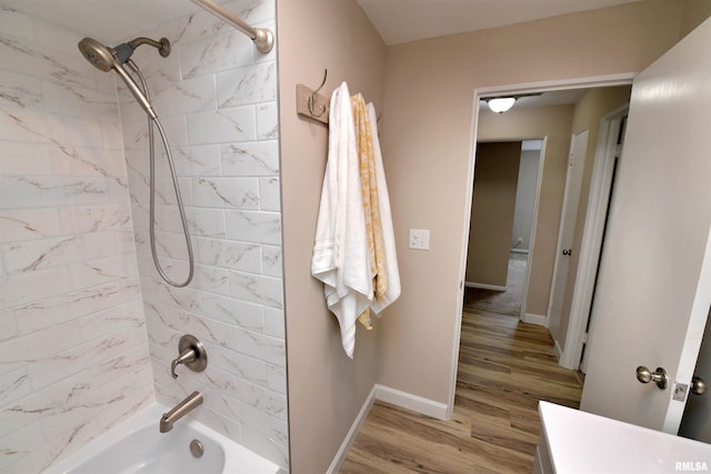 4527 N Nelson Dr, Peoria, IL 61614 - full bathroom featuring  shower combination, vanity, and wood finished floors