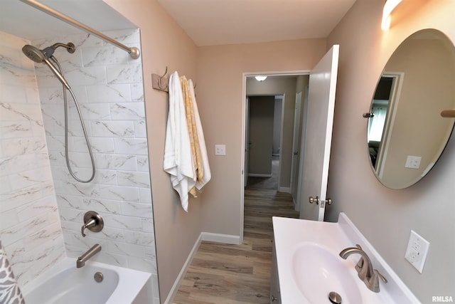 4527 N Nelson Dr, Peoria, IL 61614 - bathroom with wood finished floors, shower / bathtub combination, and vanity
