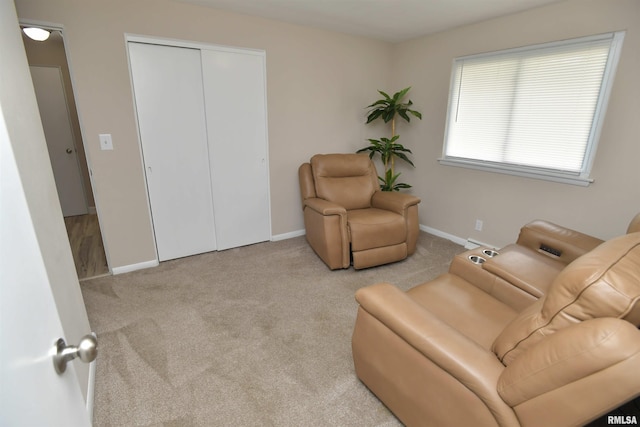 4527 N Nelson Dr, Peoria, IL 61614 - sitting room featuring baseboards and carpet floors