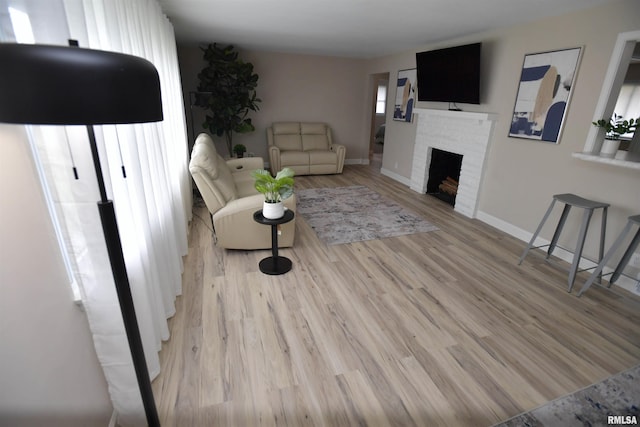 4527 N Nelson Dr, Peoria, IL 61614 - living room with a fireplace and wood finished floors